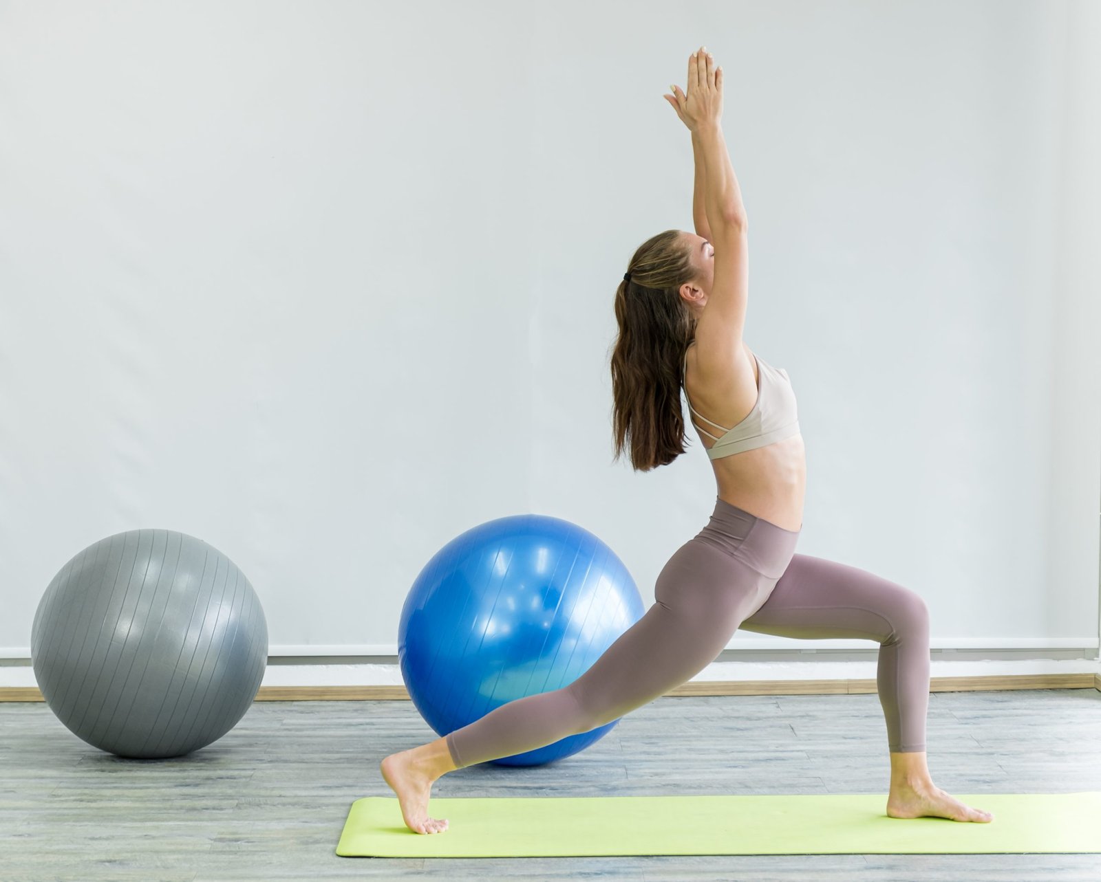 Caucasian woman exercise doing the yoga pose stretching at home,